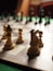 brown chess piece on chess board