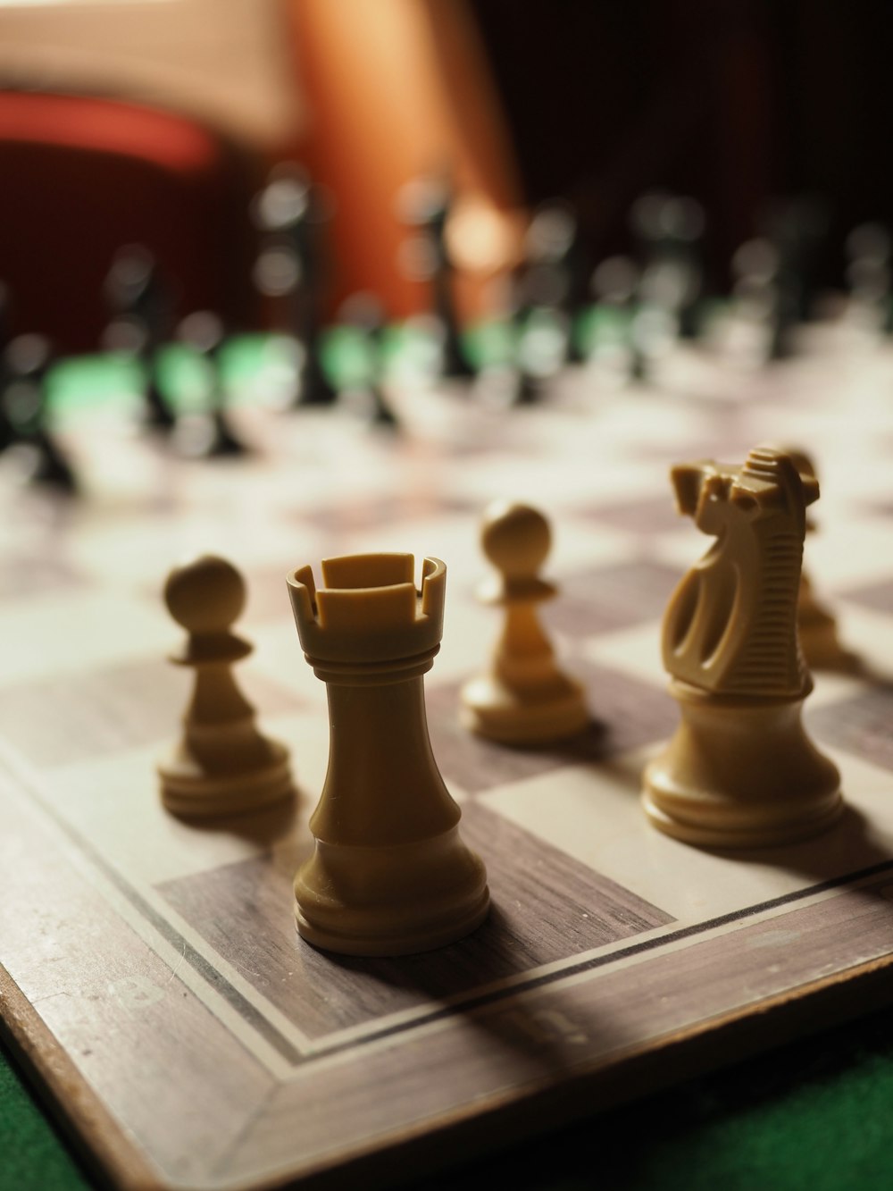 brown chess piece on table