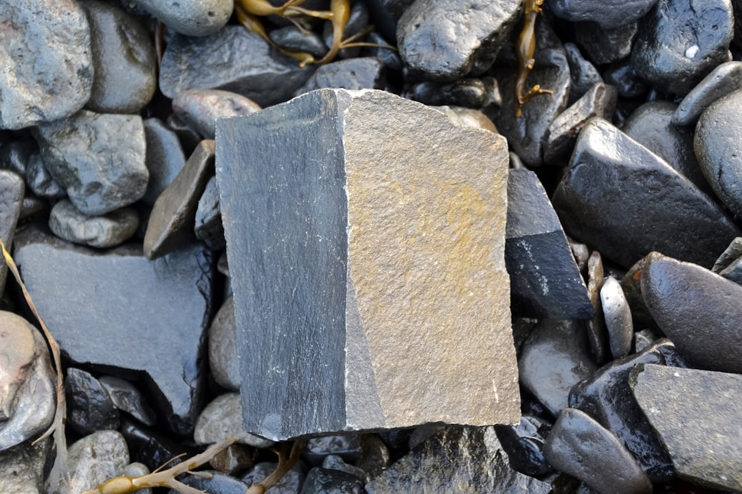 brown concrete stone on gray stones