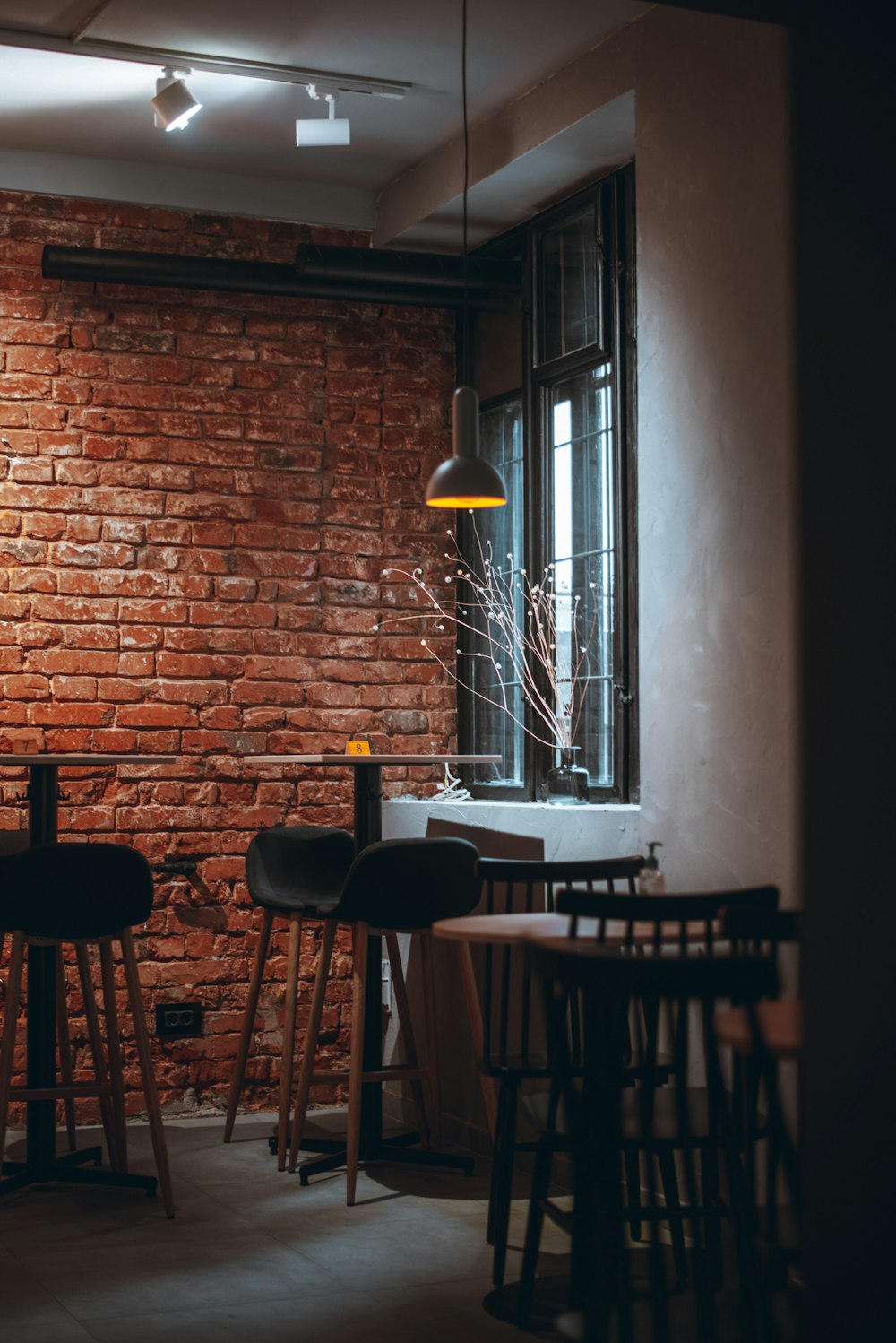 brown wooden table and chairs