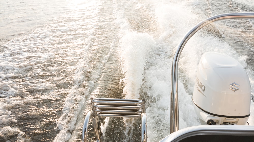 water waves hitting on stainless steel railings