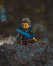 Close-up of Minecraft character holding a diamond sword, ready for adventure.