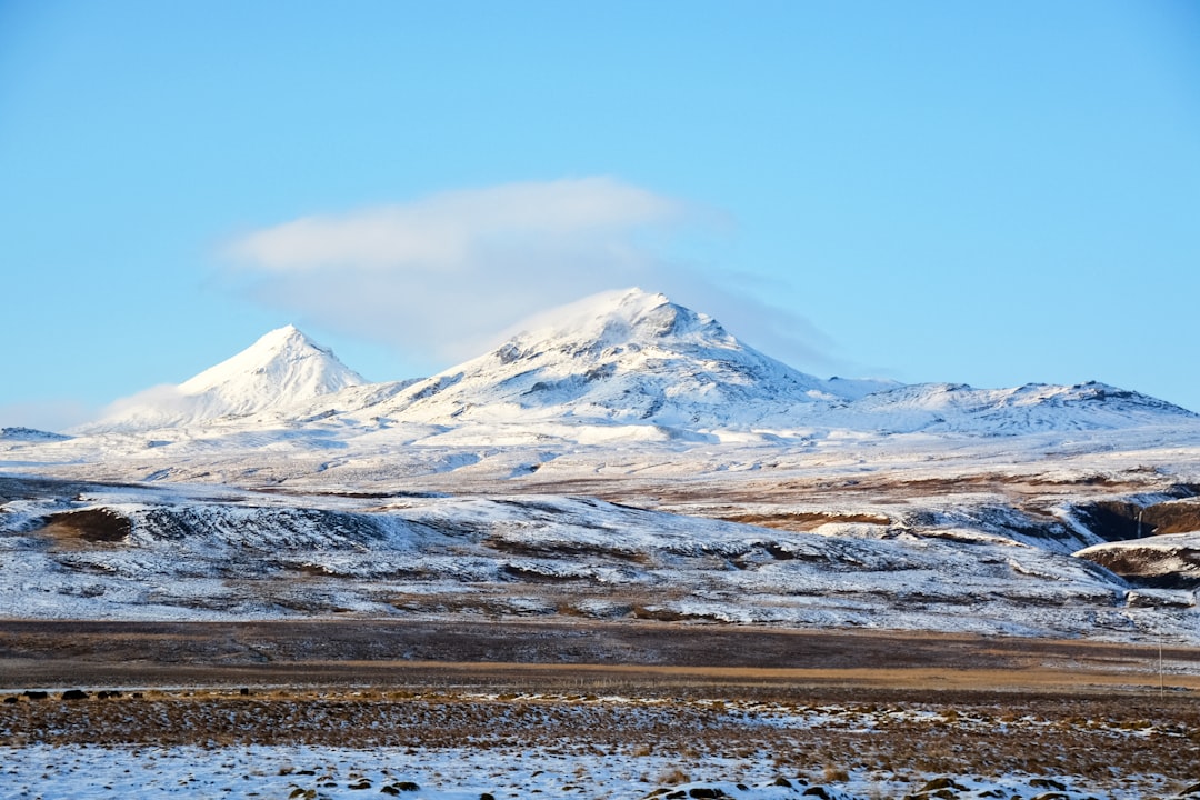 snow covered mountain during daytime