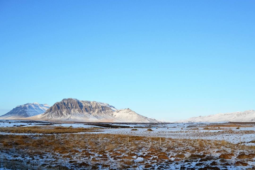 snow covered mountain during daytime