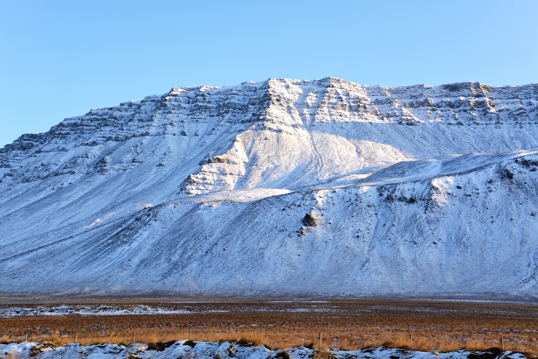 snow covered mountain during daytime