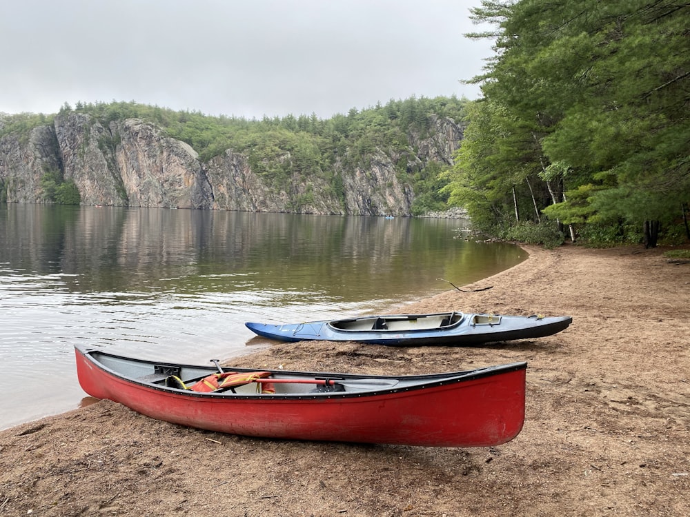 red and white boat on lake during daytime