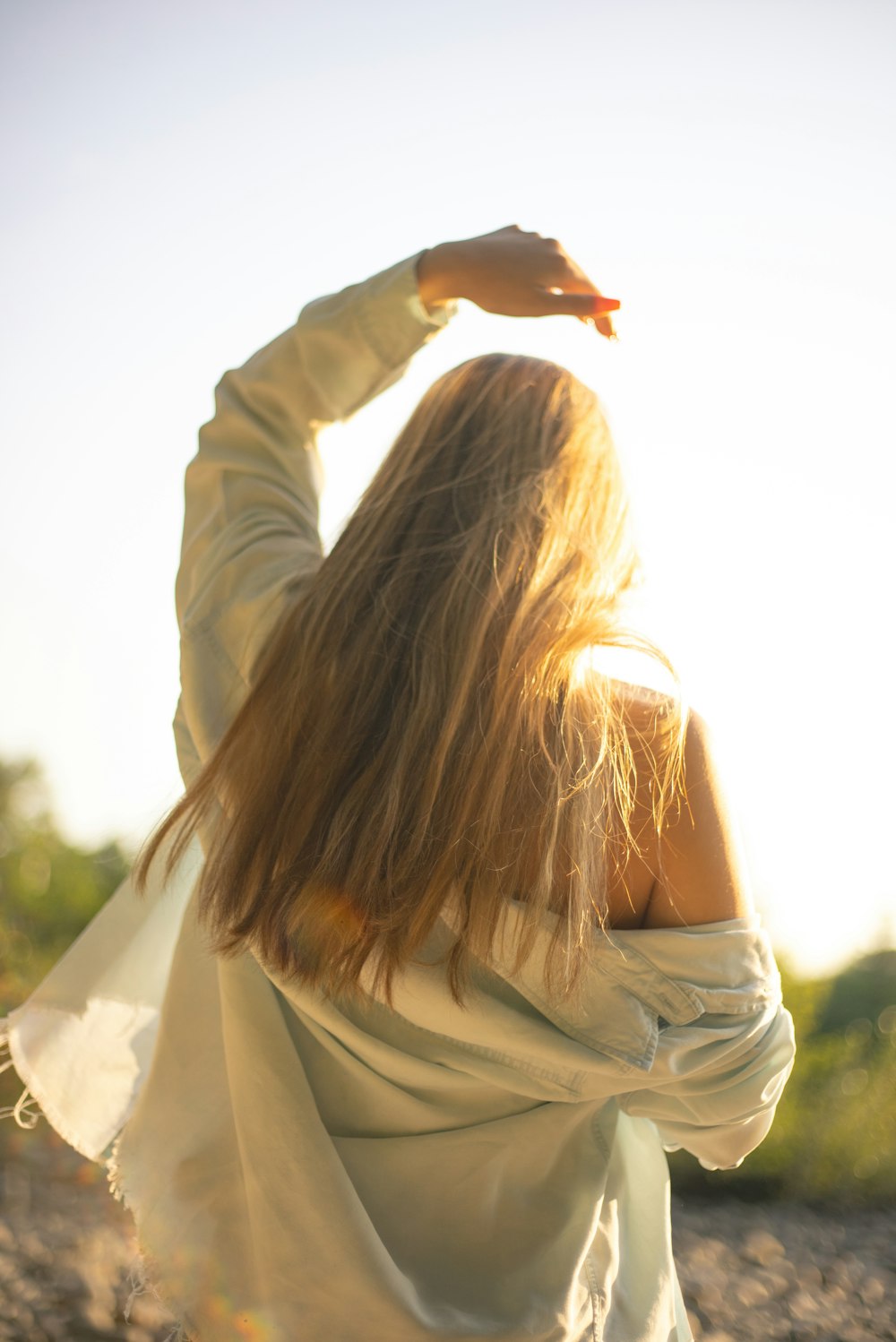 woman in white long sleeve shirt