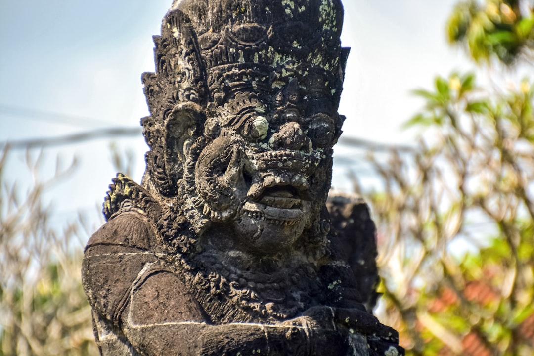 gray concrete statue during daytime