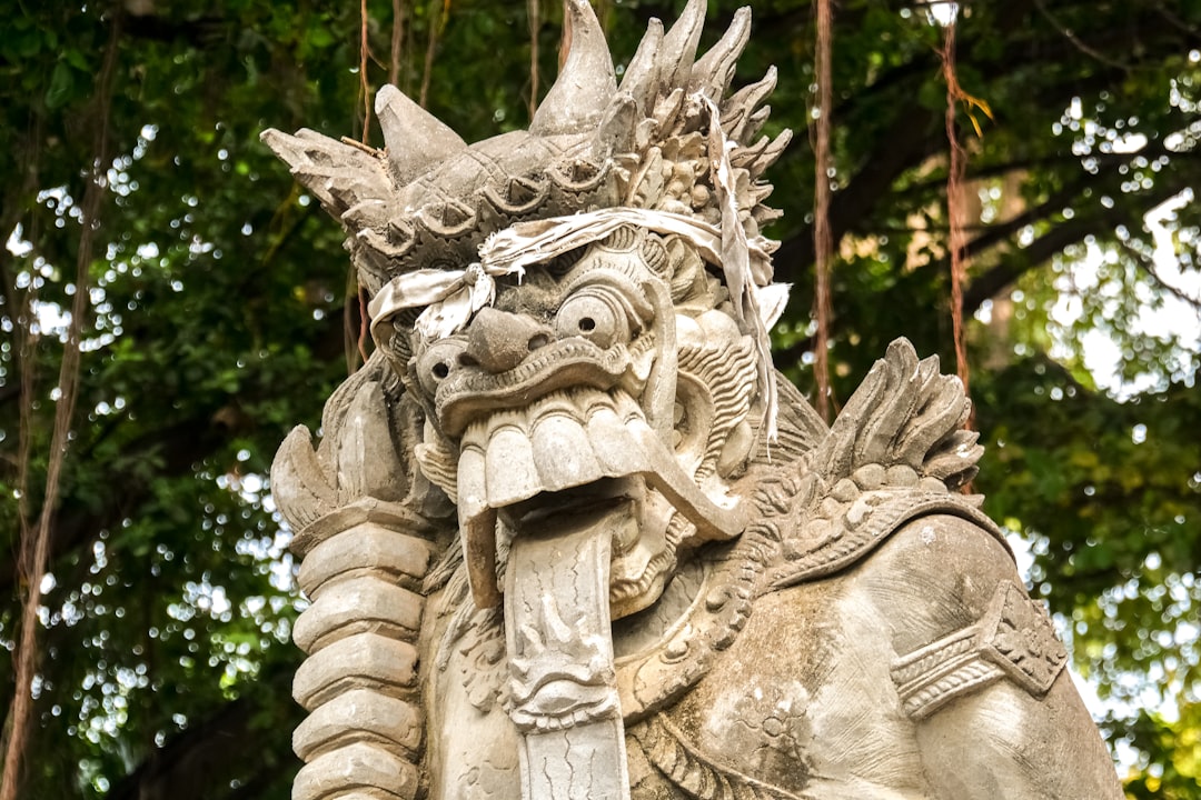 brown concrete dragon statue during daytime