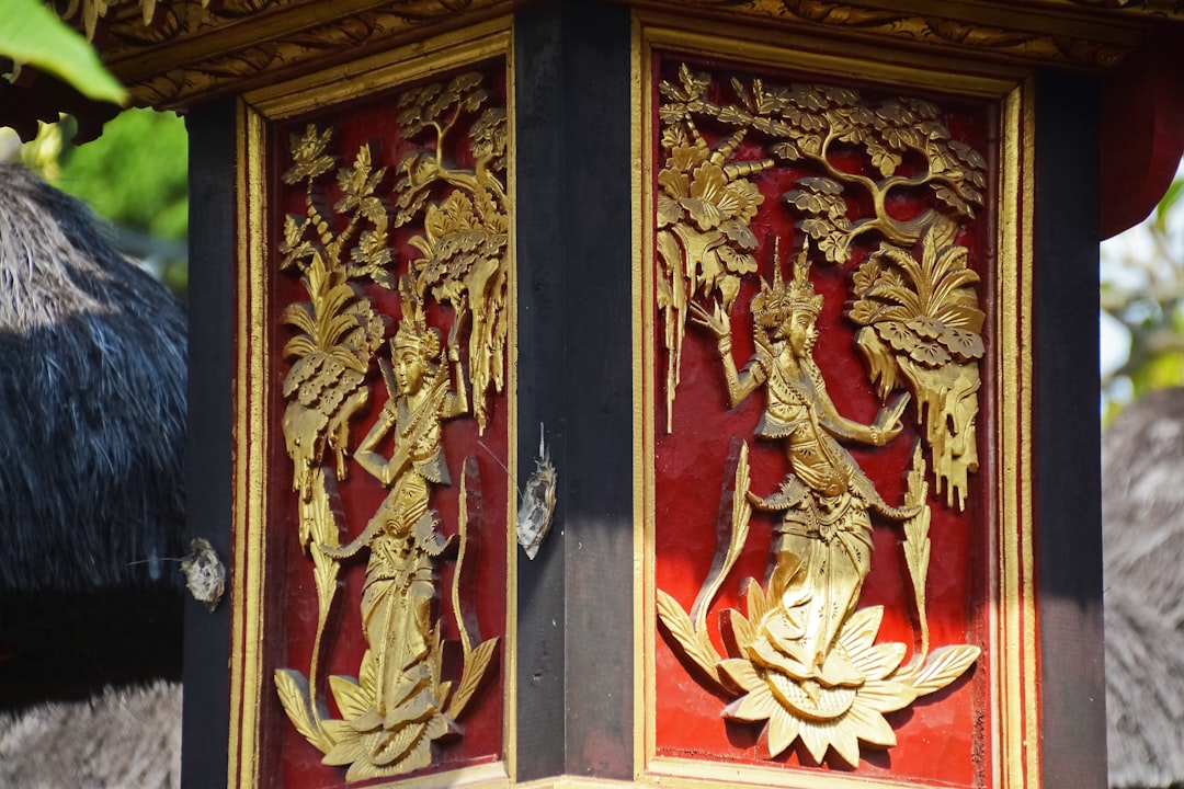 red and gold wooden door