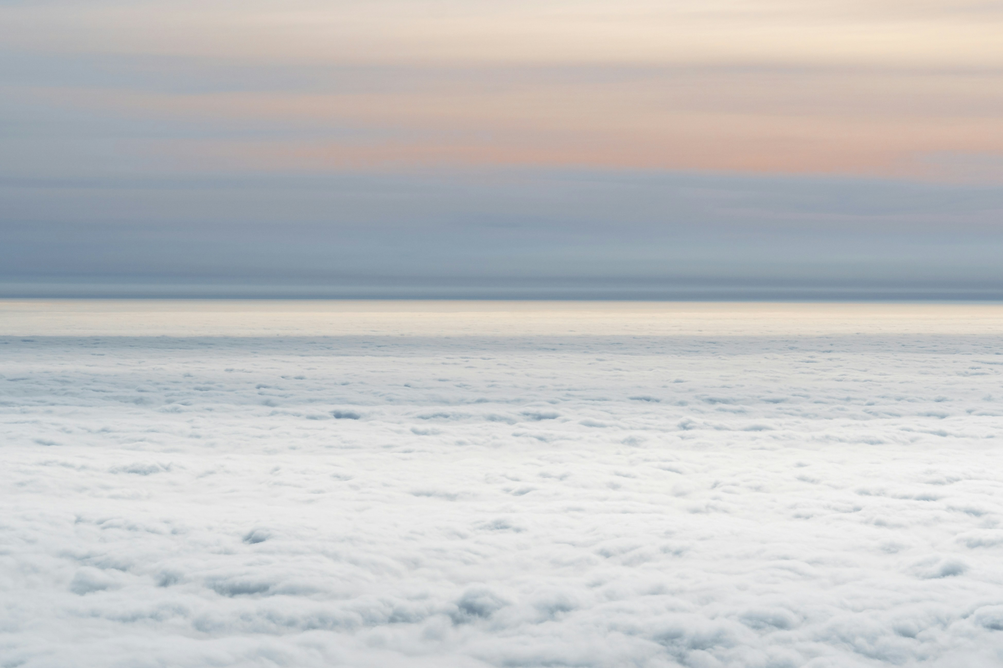 white clouds over the sea during daytime