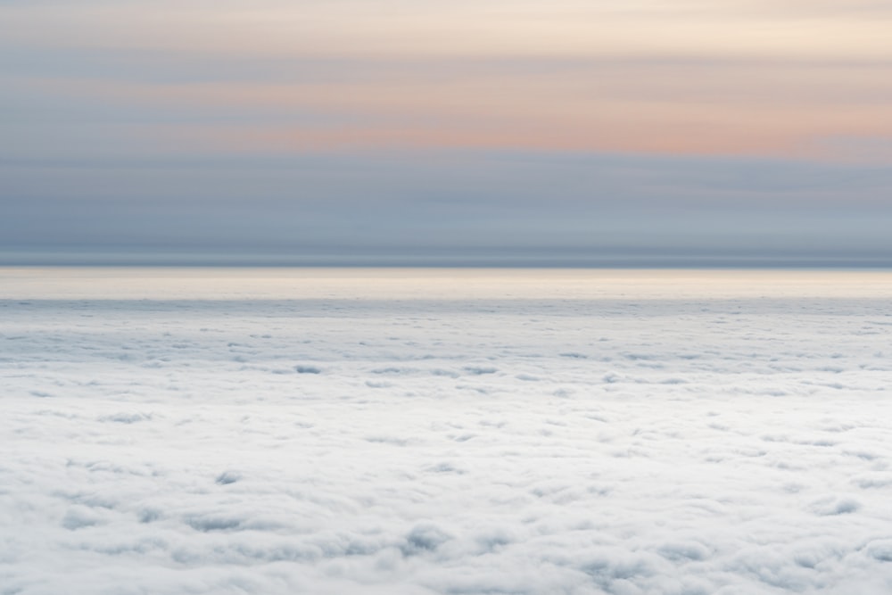 white clouds over the sea during daytime