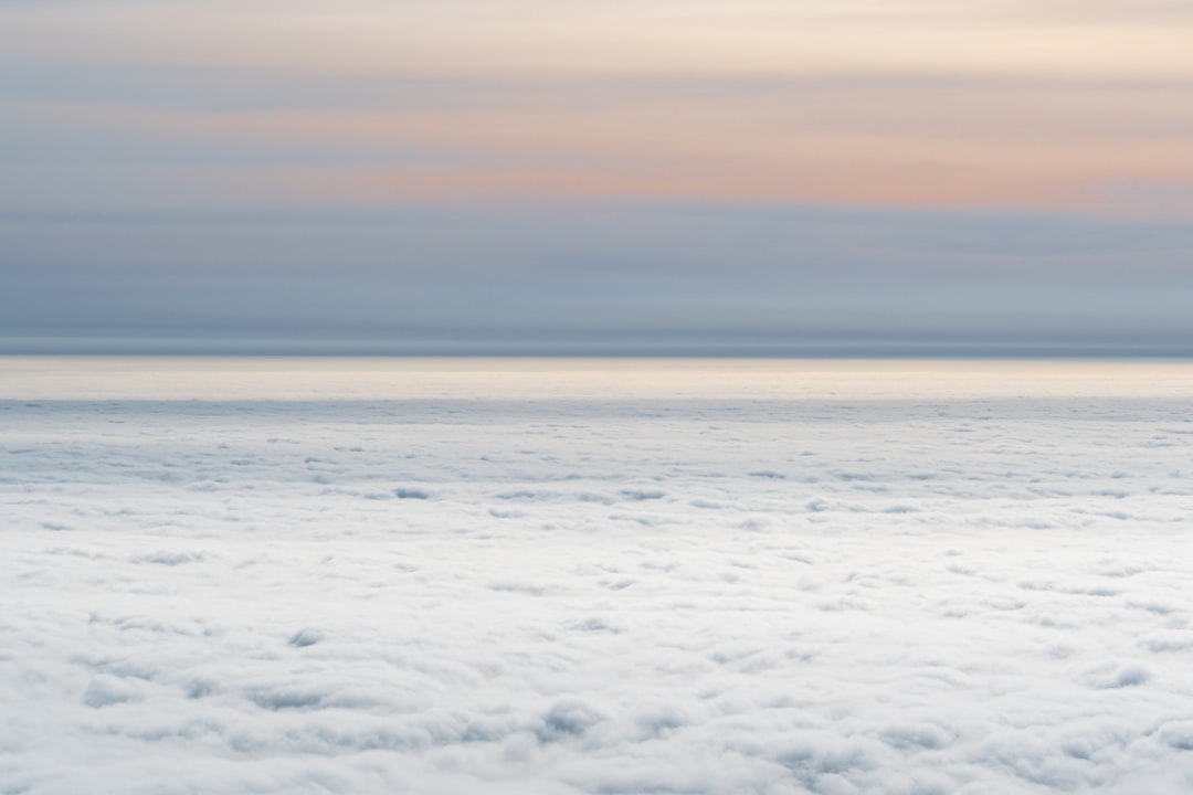 white clouds over the sea during daytime