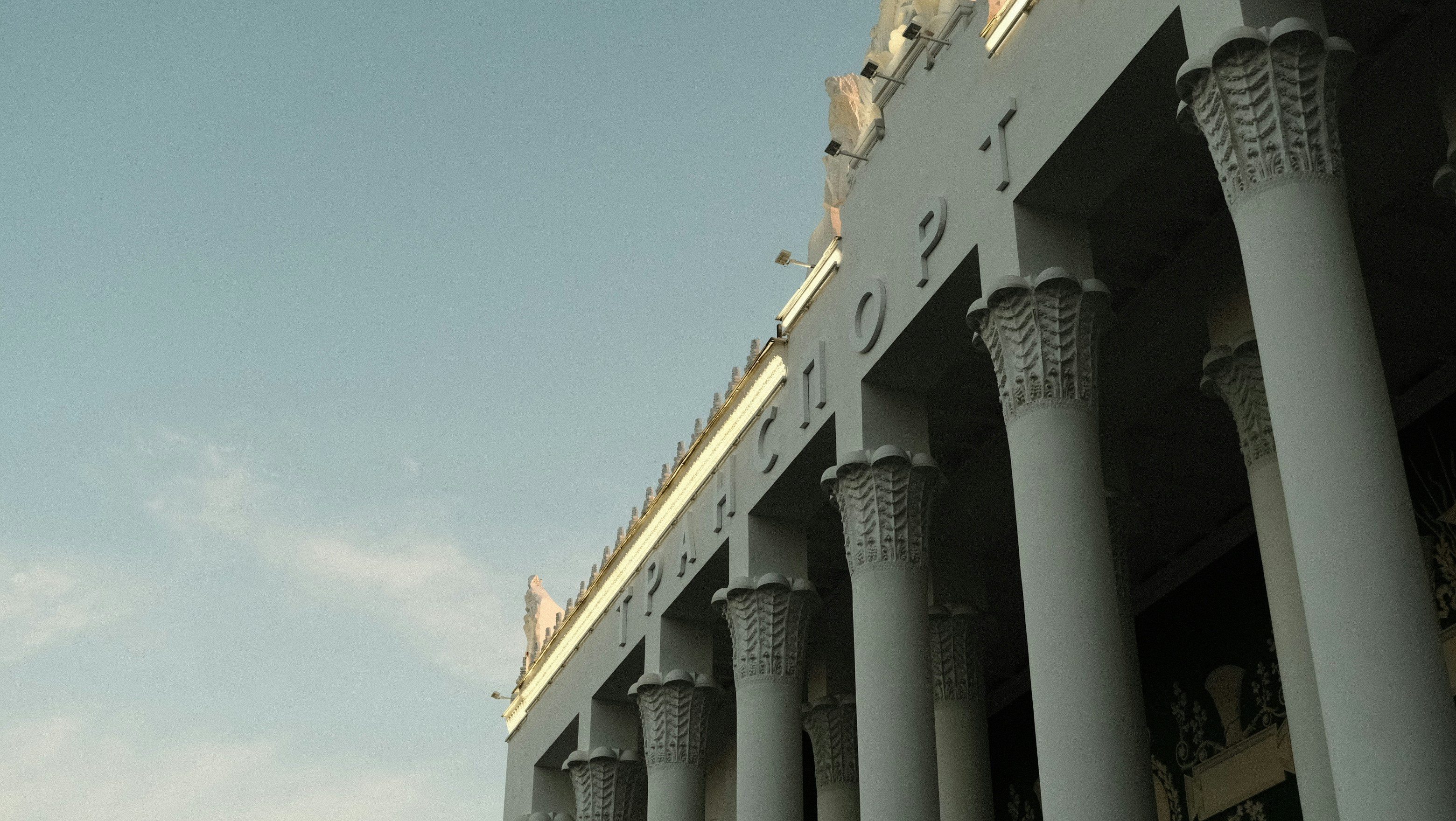 white concrete building under blue sky during daytime