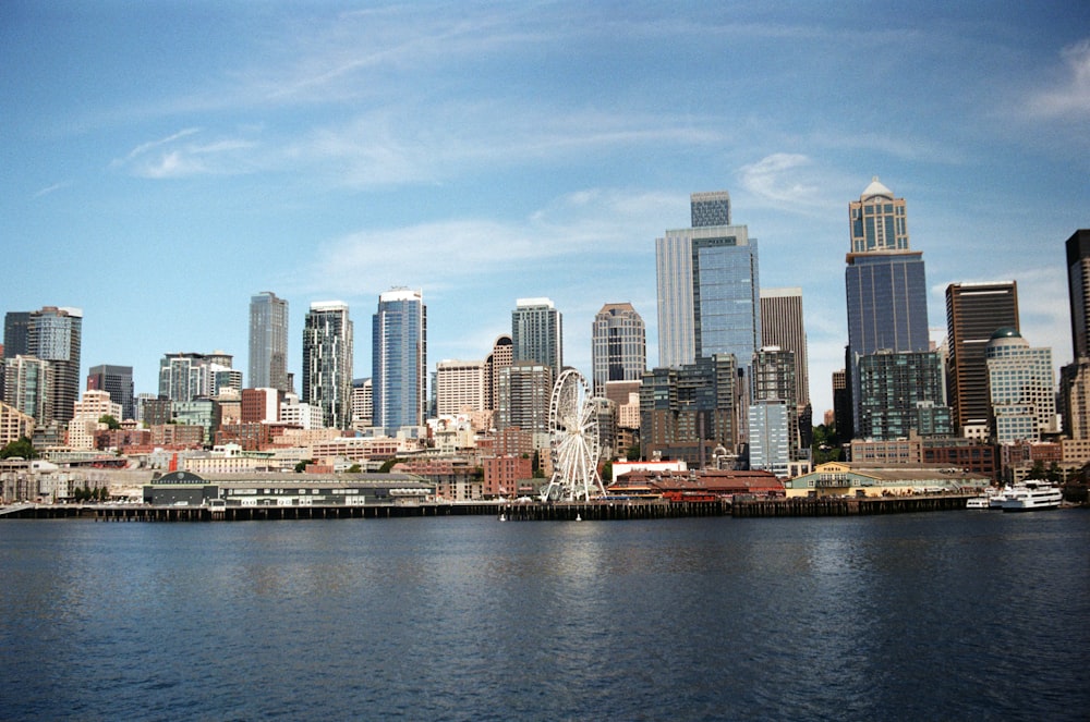 city skyline near body of water during daytime