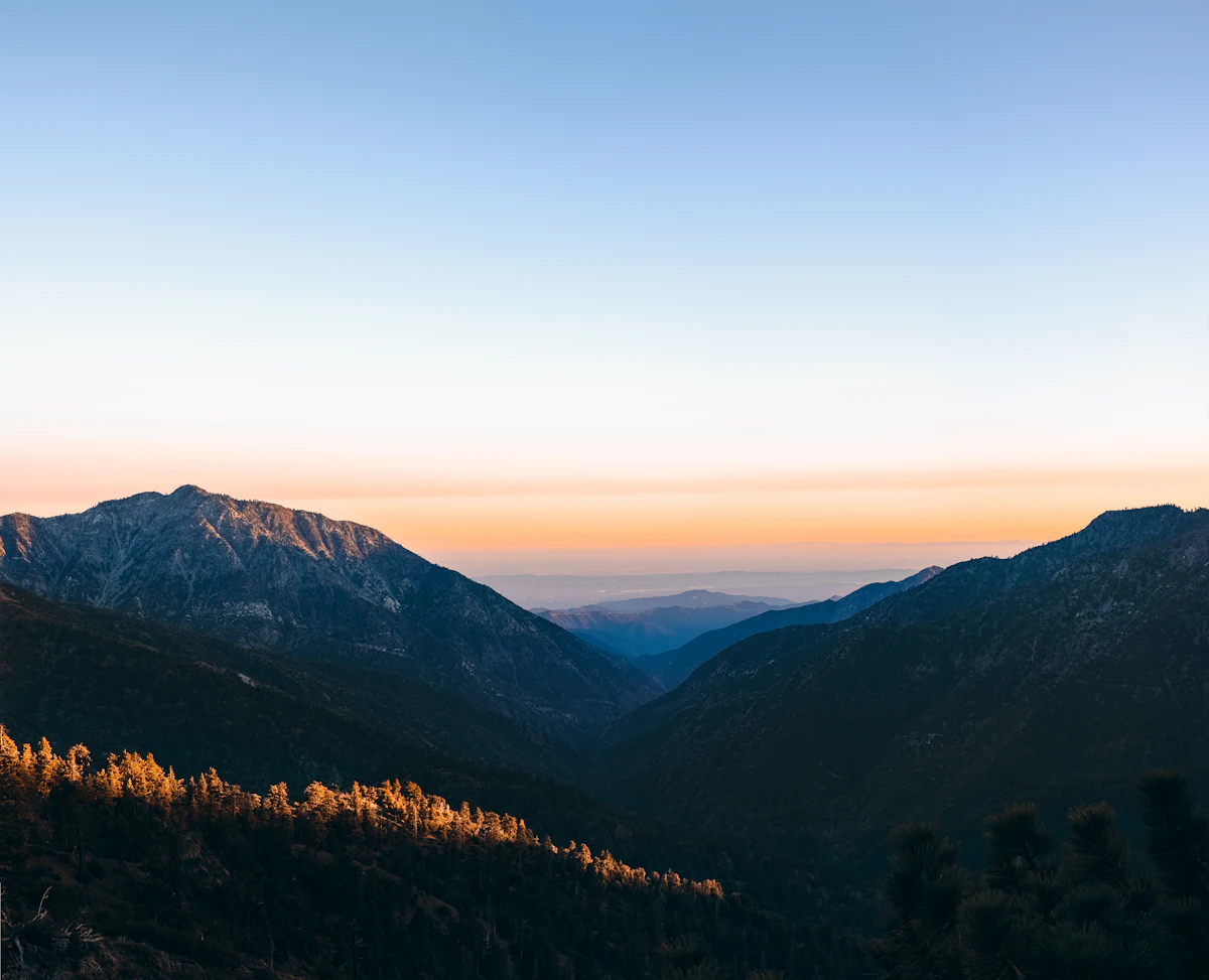 Sunset over forested ridges along the Angeles Crest Highway