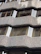 Close-up of a tightly woven balcony safety net installed on a modern Ahmedabad apartment.