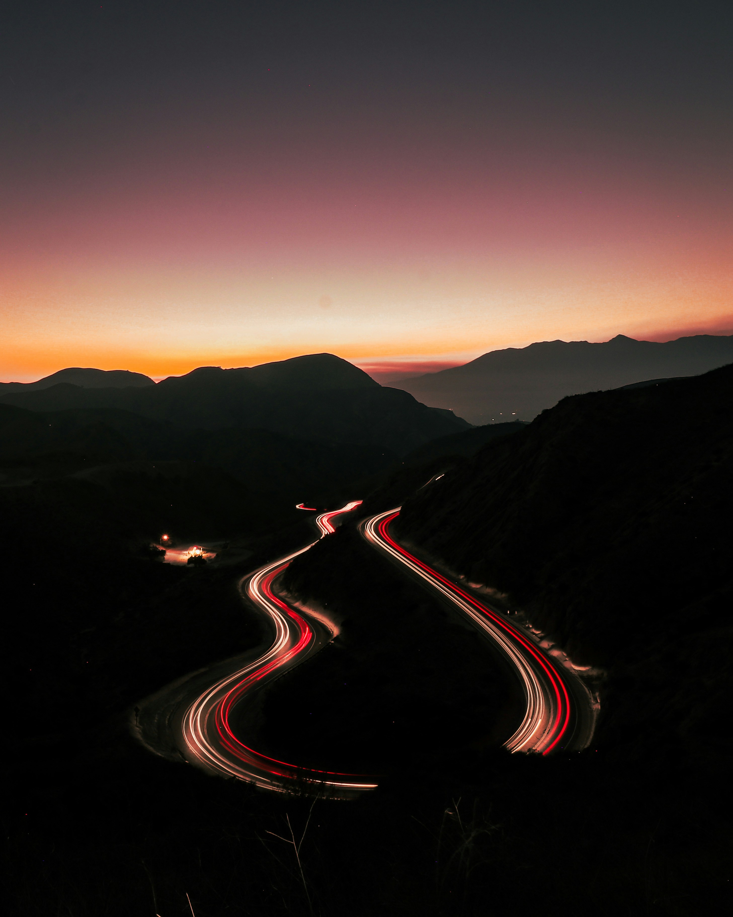 time lapse photography of cars on road during night time