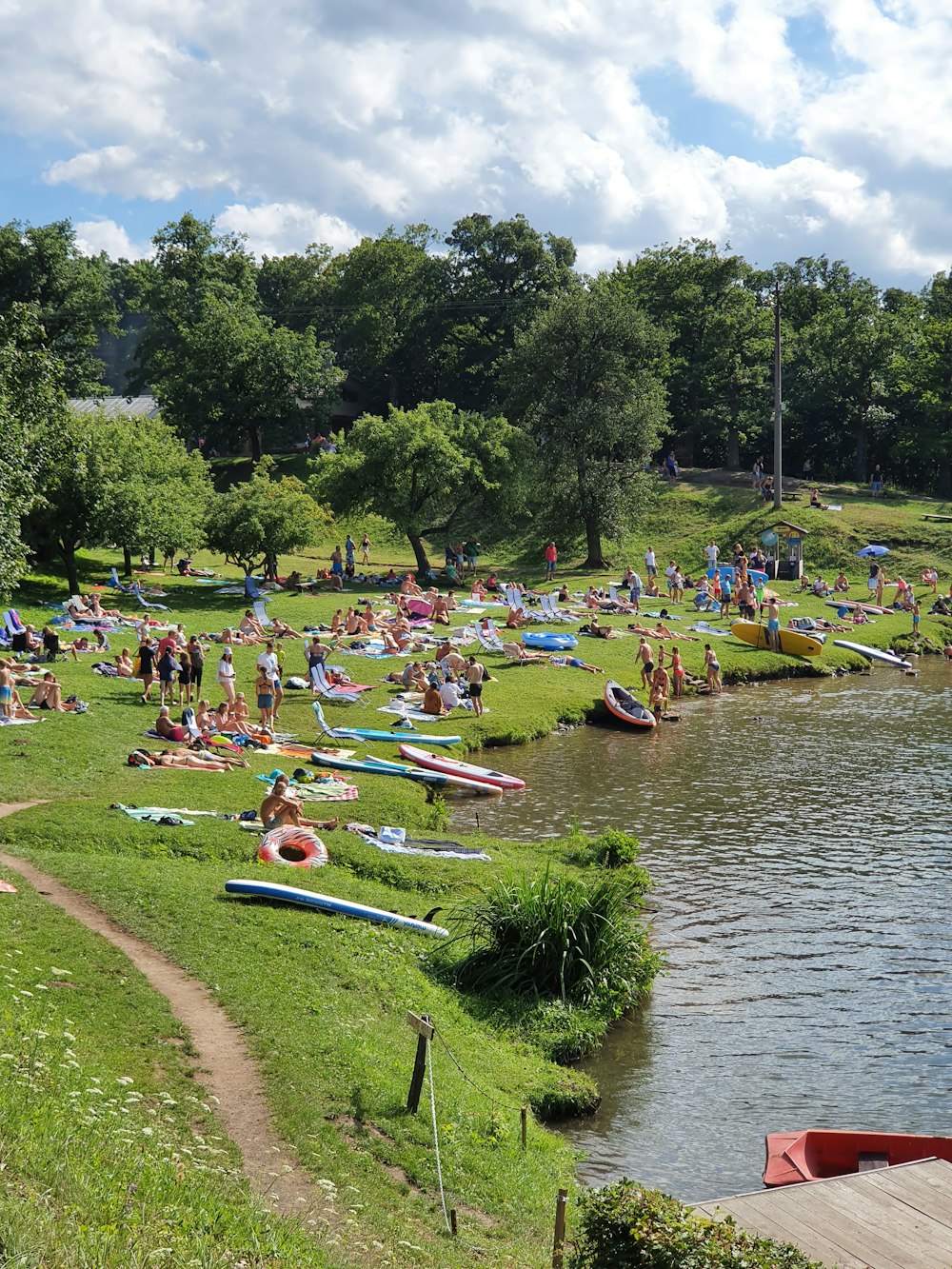 people riding on boat on river during daytime