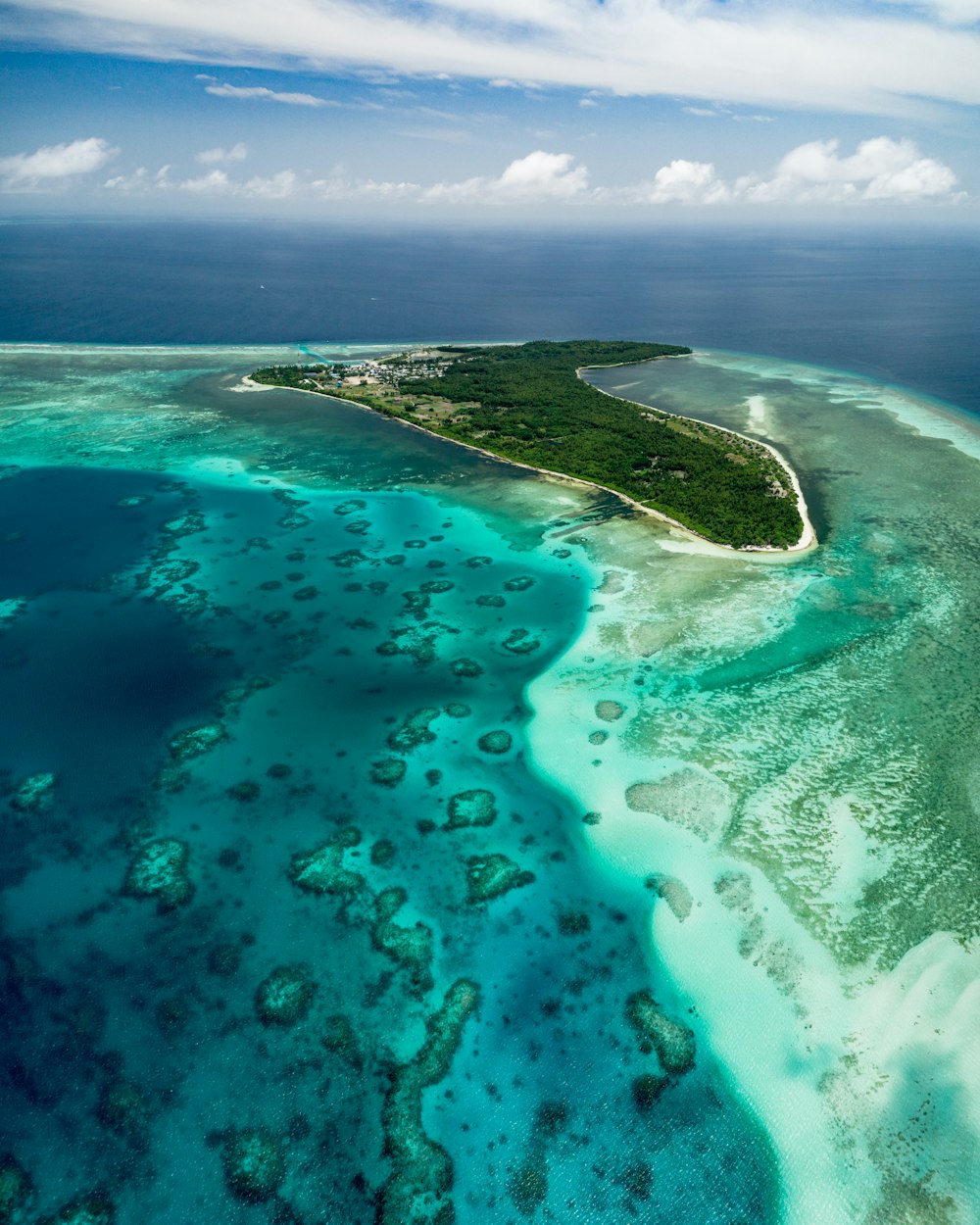 aerial view of green island during daytime