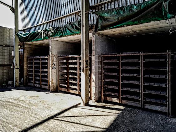 Photo of the J2 Tower warehouse entrance with neatly stacked storage units visible inside.