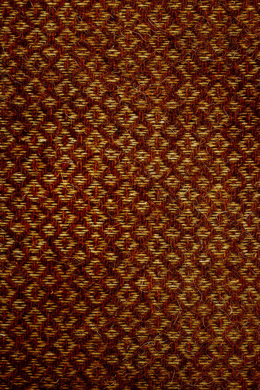 Textil marrón y negro en fotografía de primer plano