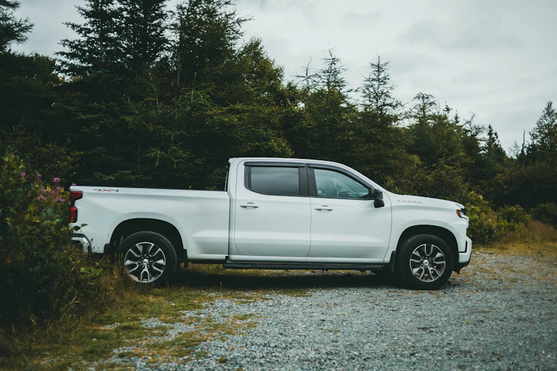White pickup truck in inventory row