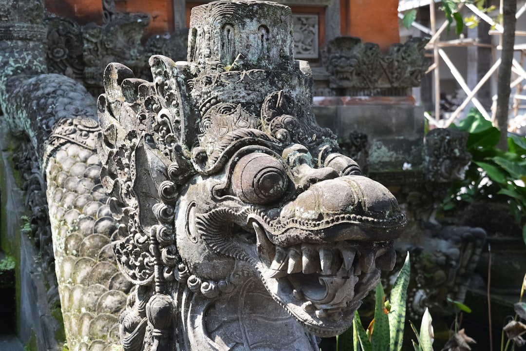 grey concrete dragon statue during daytime