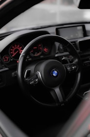 Close-up of a BMW dashboard showcasing advanced technology and luxury design.