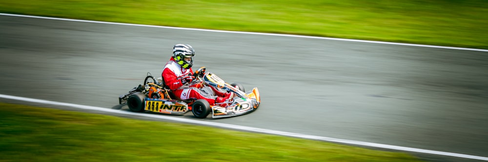 man riding on go kart