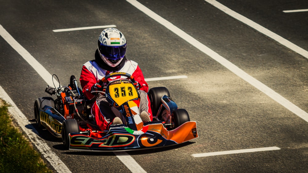 person riding on go kart