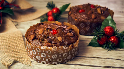 Traditional dark spiced Christmas plum cake loaded with rum-soaked dried fruits
