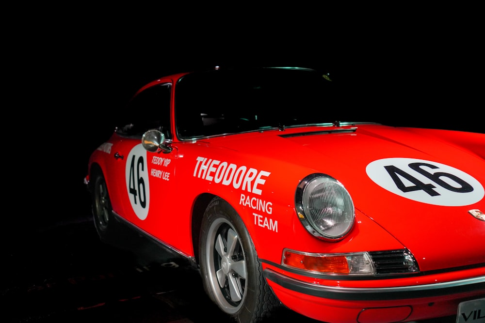 red and black porsche 911