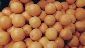 orange fruits on blue container