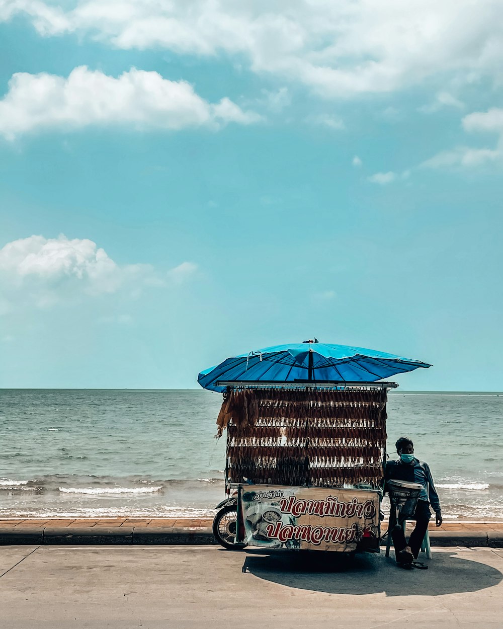 people standing on beach during daytime