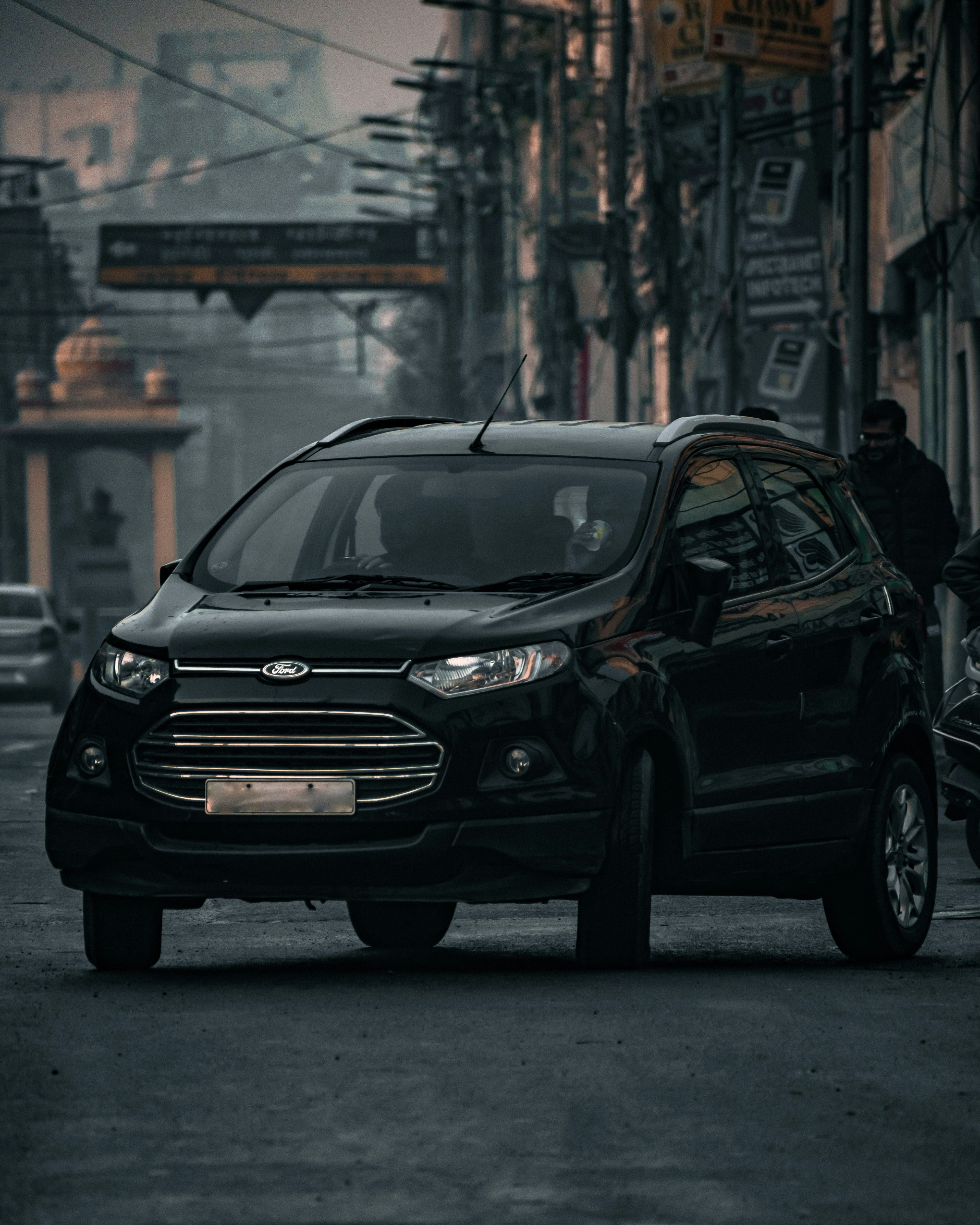 black mercedes benz c class on road during daytime