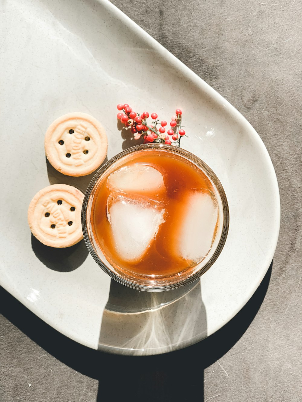 white ceramic cup with brown liquid