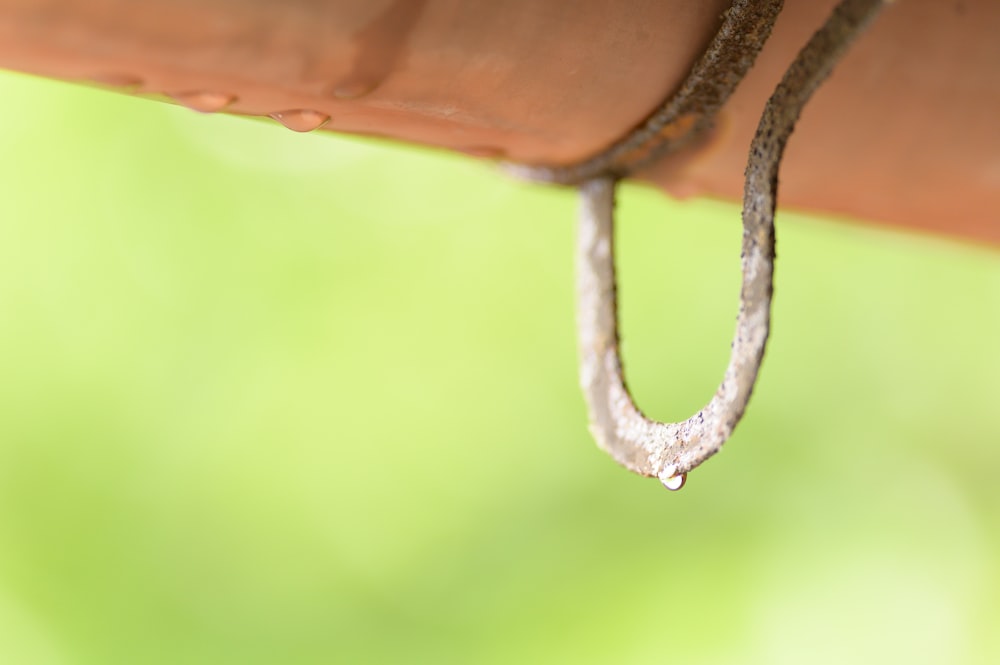 brown metal tool in close up photography