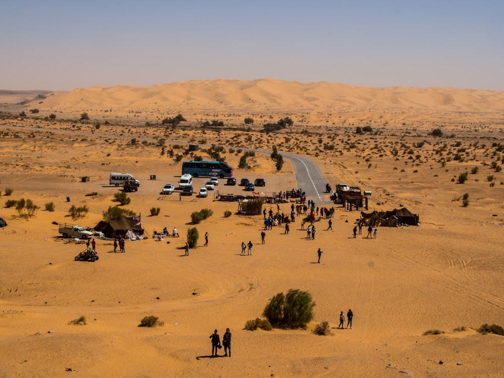 people on desert during daytime