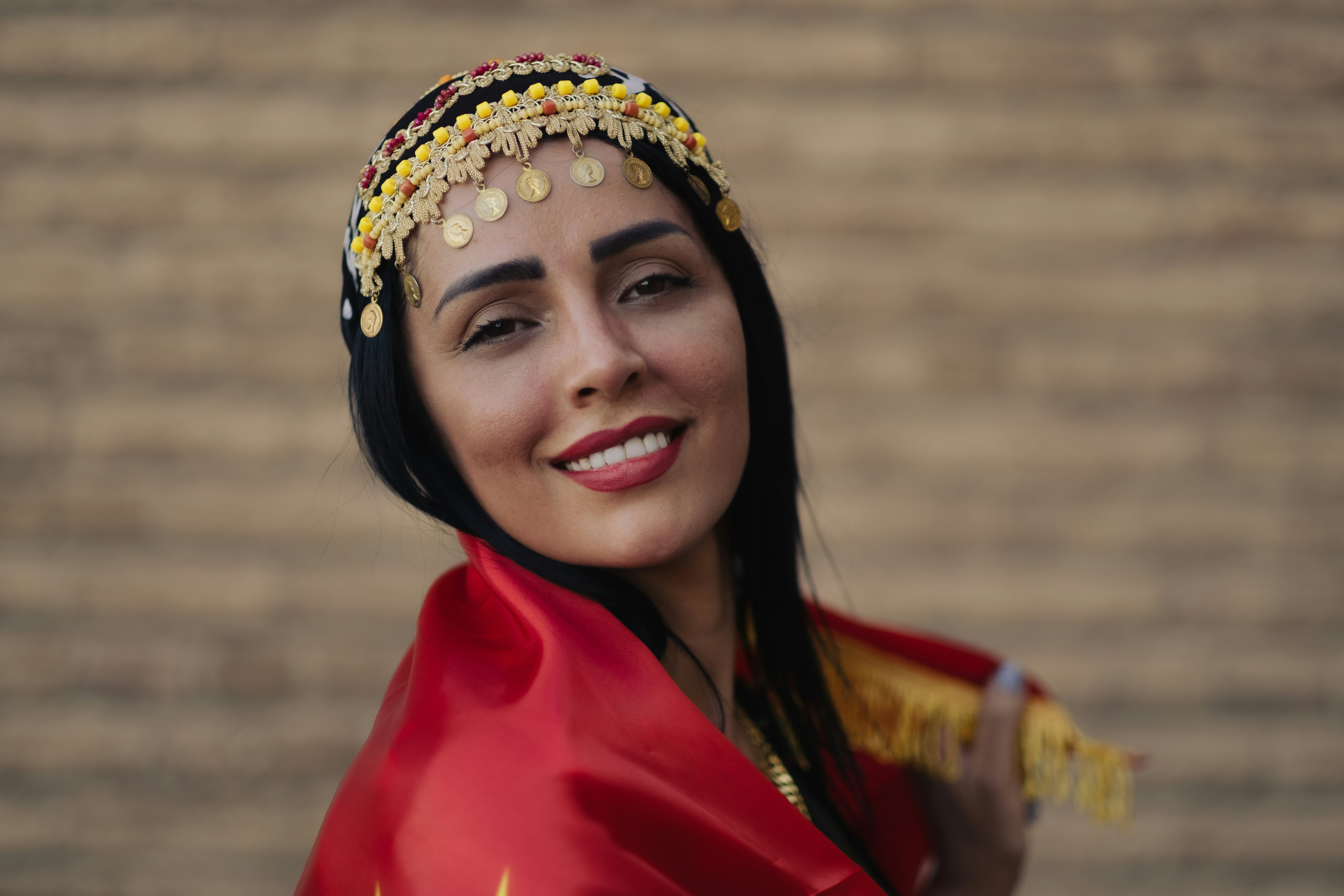 woman in red dress wearing gold crown