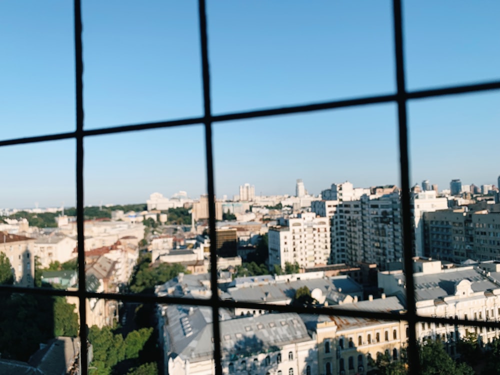 city buildings under blue sky during daytime