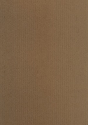 brown textile in close up photography