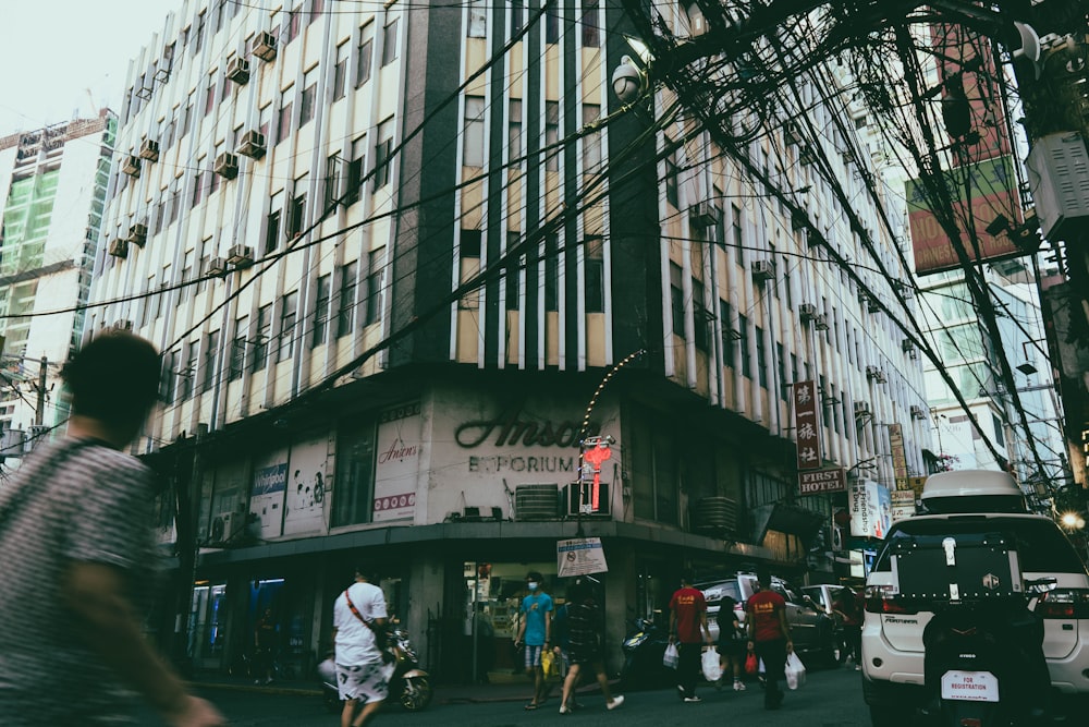 people walking on street near buildings during daytime