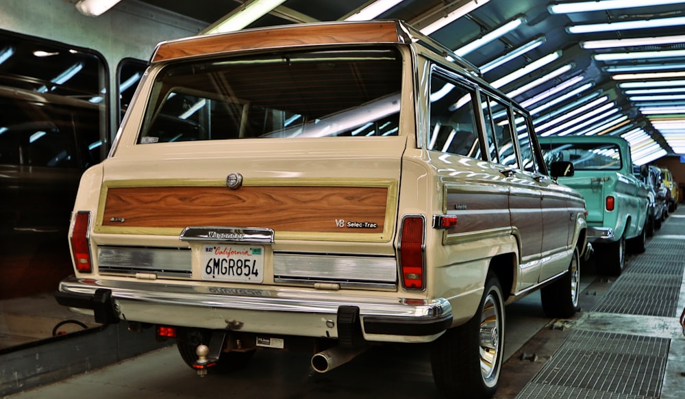 brown and white suv in a garage