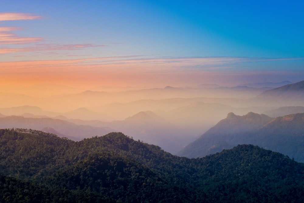 green mountains under blue sky during daytime