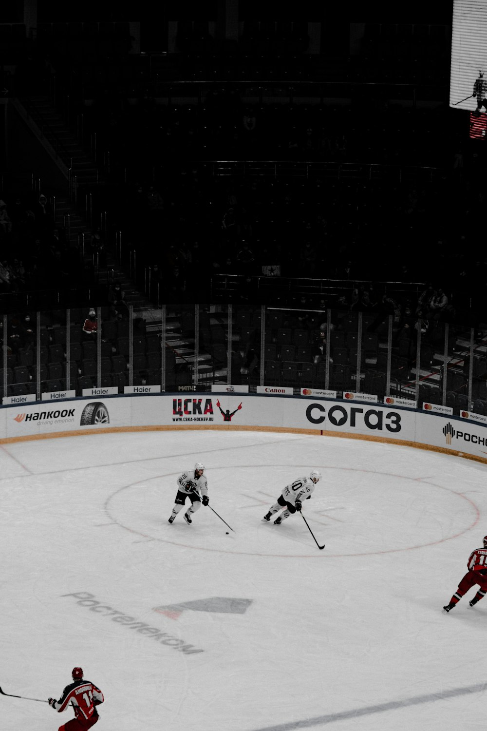 ice hockey players on ice hockey stadium