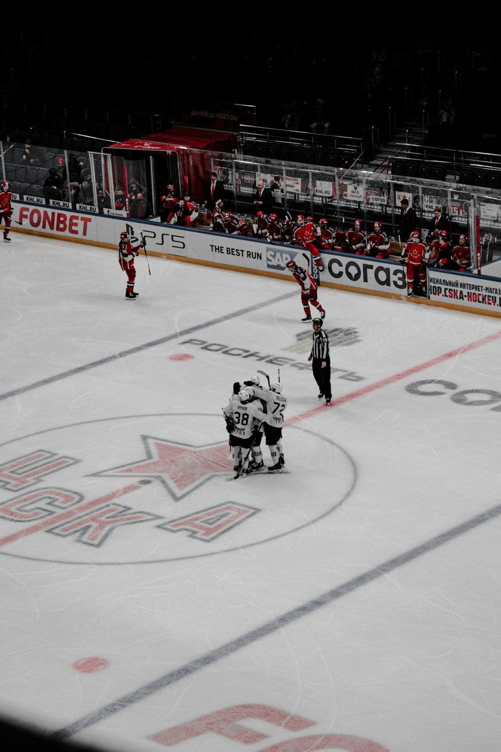 ice hockey players on ice hockey stadium