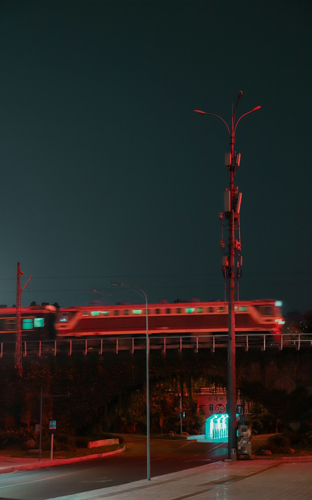 red and white train during night time