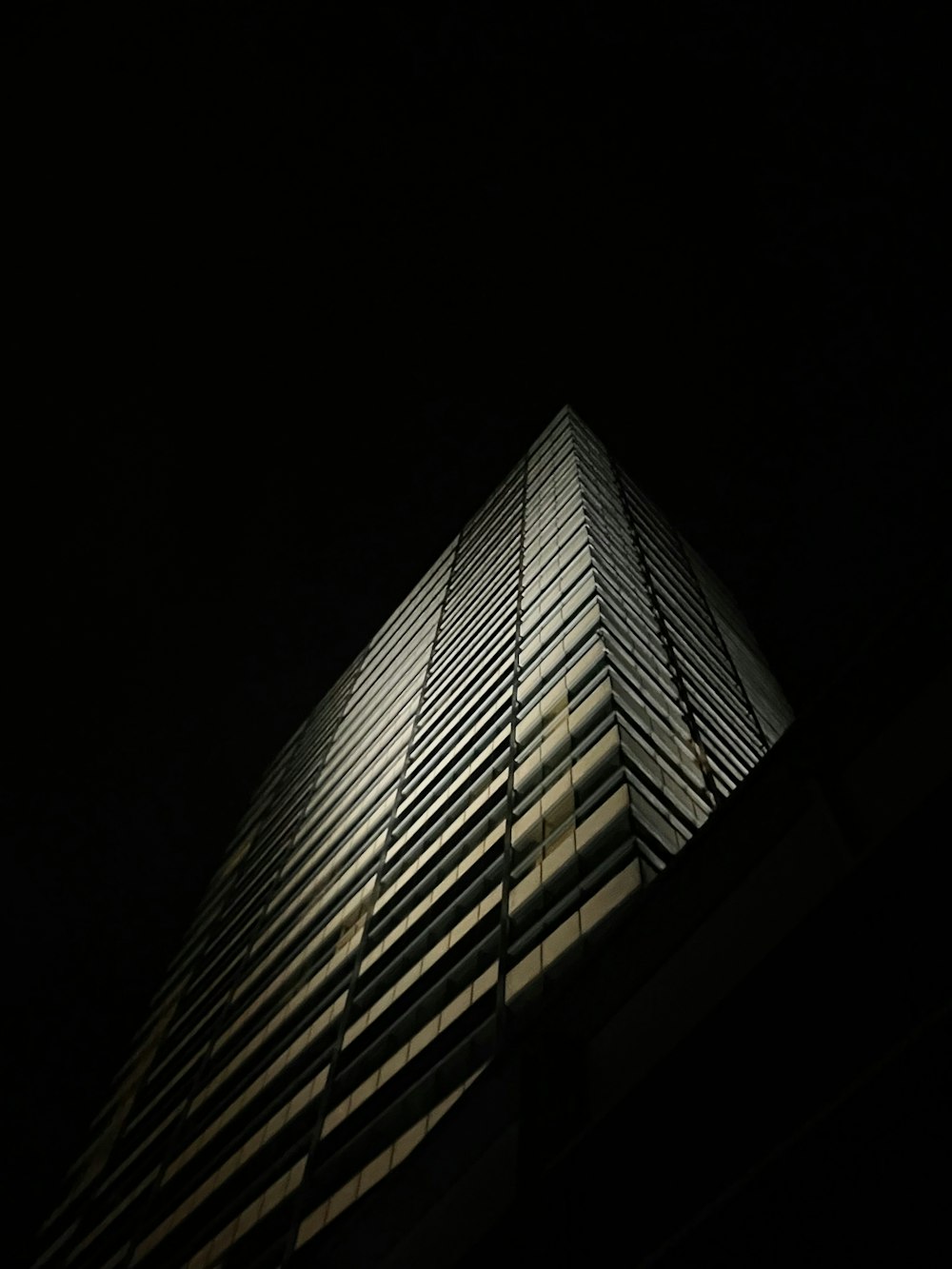 grayscale photo of high rise building