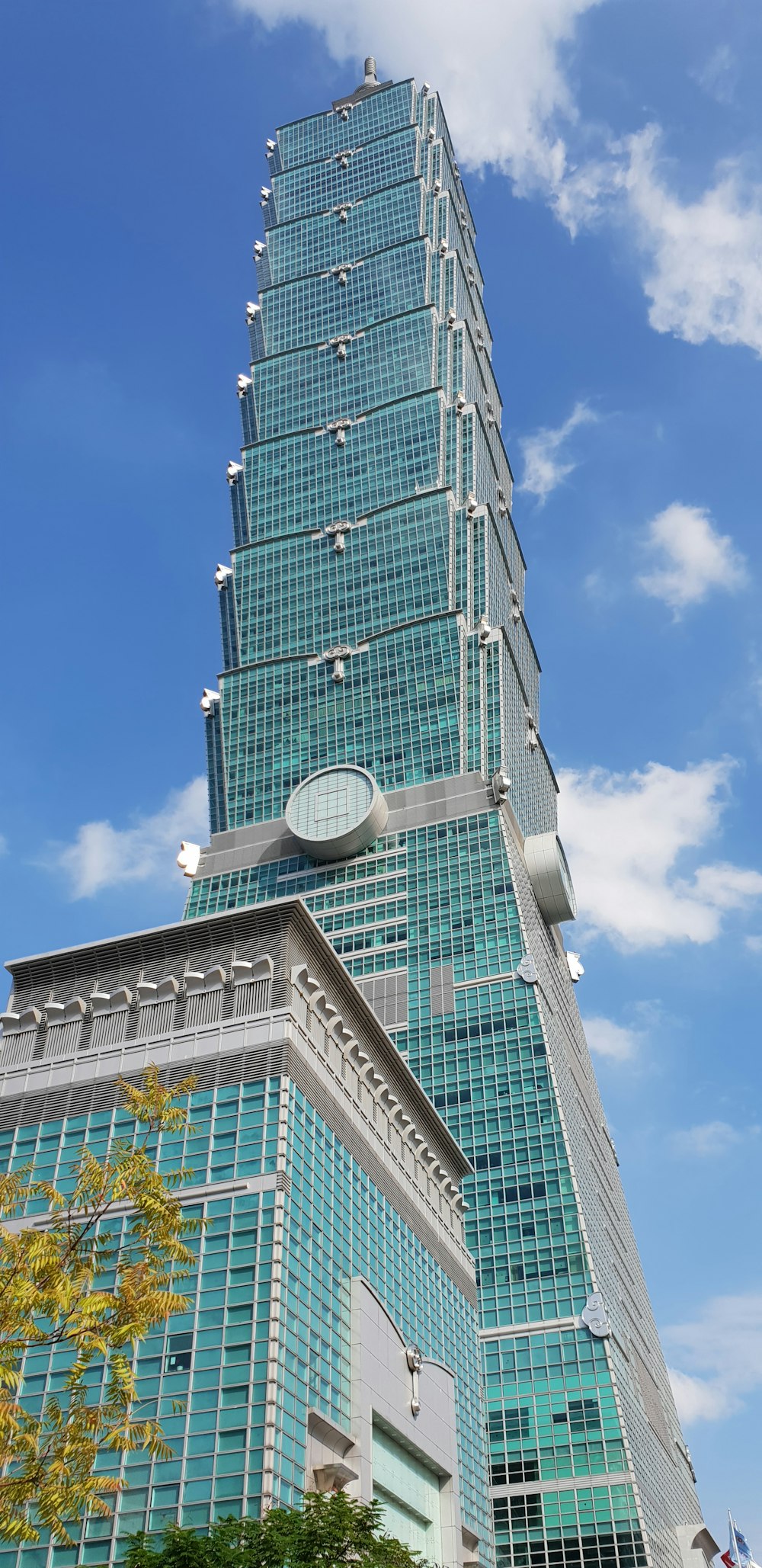 green and white high rise building